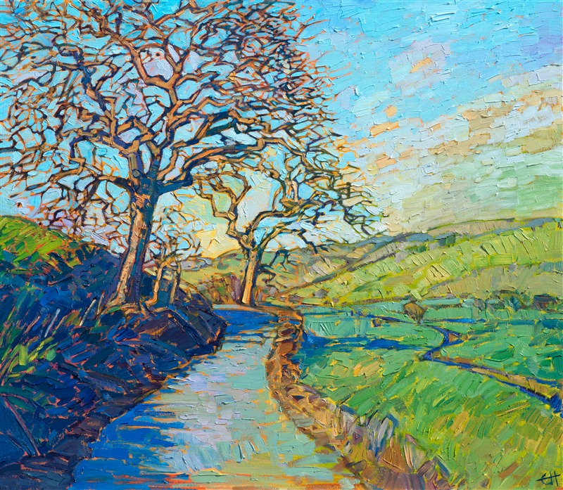 This winding road leads you through the grassy hillsides of Paso Robles, California wine country.  In the early spring the hills are covered in crispy frost early in the morning, and then as dawn thaws the ground, the landscape turns from silver-gray to apple green. This painting captures such a morning with loose, expressive brush strokes.</p><p>This oil painting was created on 1-1/2" canvas, with the edges of the canvas finished as a continuation of the painting.  The piece has been framed and arrives ready to hang.