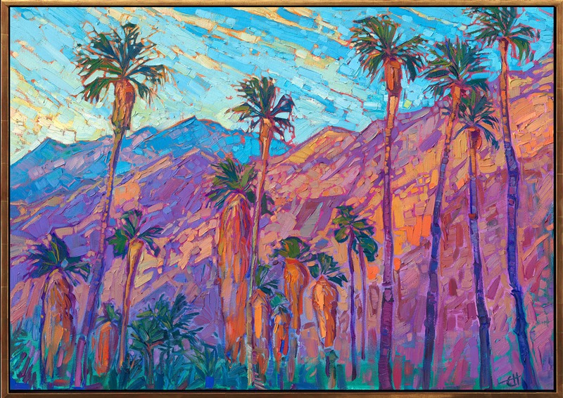 A line of palm trees stands before the San Jacinto mountains in Palm Springs. The steep desert mountains catch the first rays of dawn and turn fiery hues of orange and gold in the morning light. Thick brush strokes of oil paint capture the feeling of movement and vivacity of the scene.</p><p>"Mountain Palms II" is an original oil painting done on stretched canvas. The piece arrives framed in a custom-made, gold floater frame.