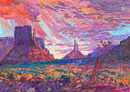 Deep in Monument Valley, standing between the looming Mittens, a passing monsoon showered down upon the red desert earth. The buttes glowed pink and purple in the light of the setting sun, while the green and gold desert shrubs glinted in the fading light.

"Desert Monsoon" is an original oil painting created on stretched canvas and framed in a contemporary gold floater frame.