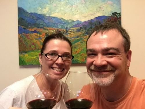 The proud owners of Napa in Color, oil on canvas, by Erin Hanson celebrate the new addition to their collection.